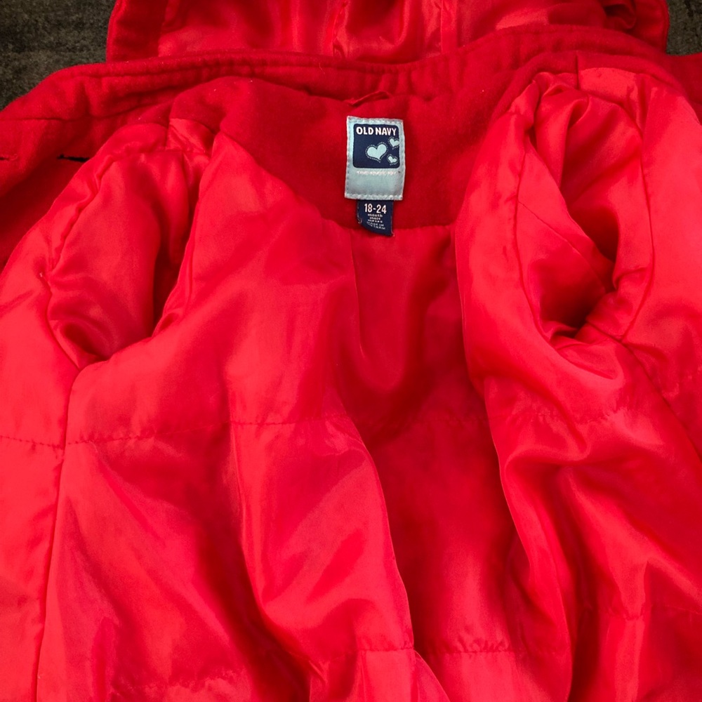 A toddler red coat